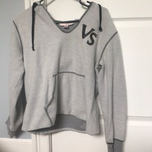 A gray thick victoria secret hoodie crop top